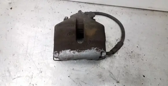 Volkswagen Jetta VI Front brake caliper 581