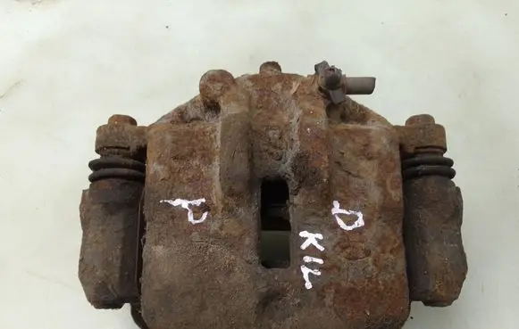 KIA Carens I Front brake caliper