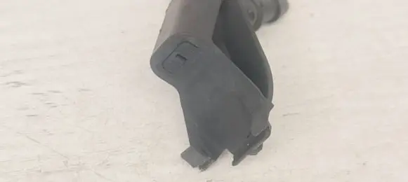 Windshield washer spray nozzle