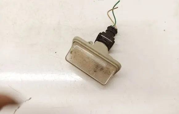 Toyota Avensis T250 Number plate light E1001479