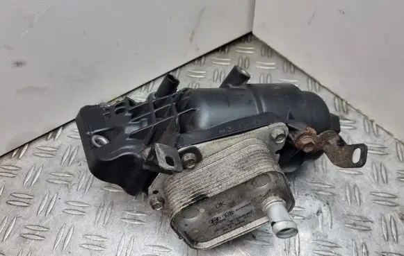 KIA Rio Oil filter mounting bracket 264002A026 264102A010 K0100200