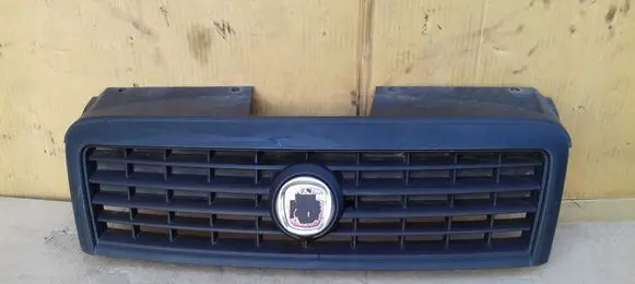 Fiat Doblo Front bumper upper radiator grill 735395576
