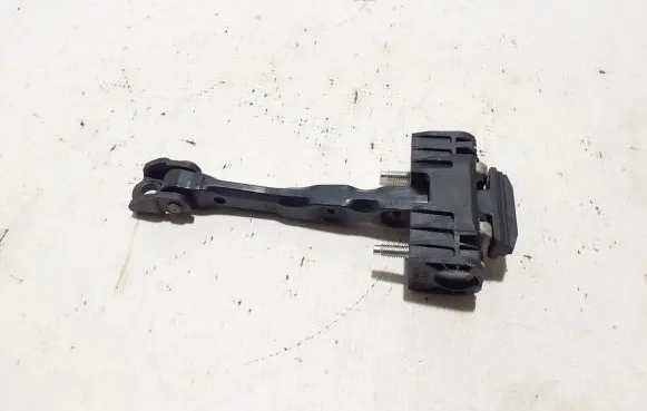 Front door check strap stopper