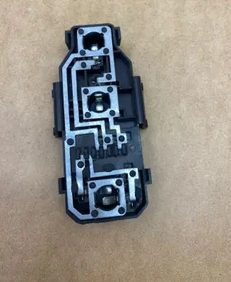 Tail light bulb cover holder
