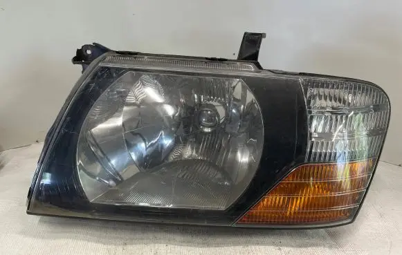 Mitsubishi Pajero Sport I Headlight/headlamp 10087420