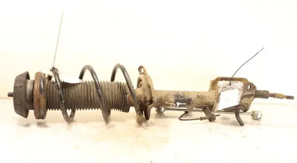 Suzuki Swift I Front shock absorber with coil spring