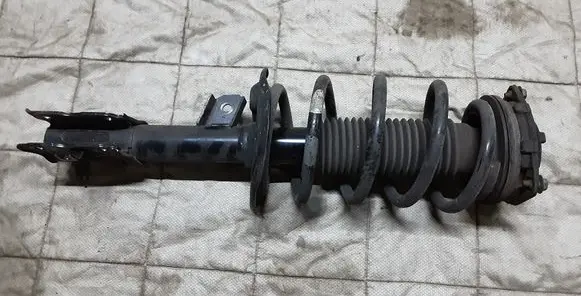 Nissan Qashqai Front shock absorber with coil spring