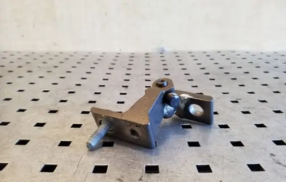 Rear door upper hinge