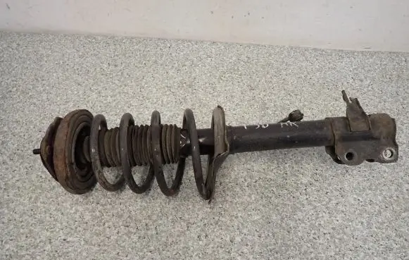 Nissan X-Trail T30 Front shock absorber with coil spring