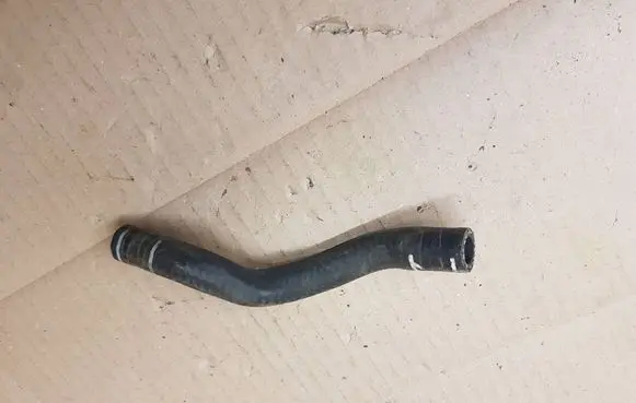 Volkswagen Golf VII Engine coolant pipe/hose 04E122447BF