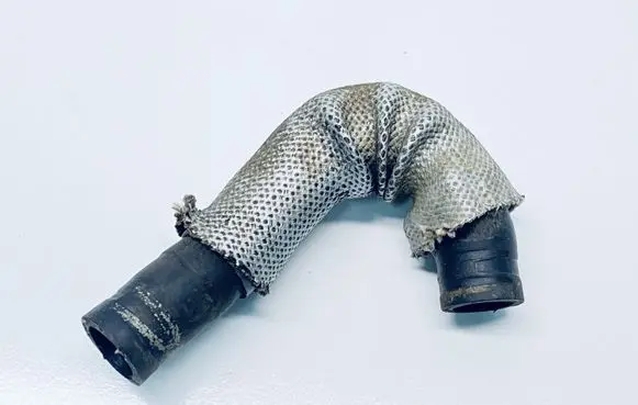 Volkswagen Touareg II Engine coolant pipe/hose 7P0121157E
