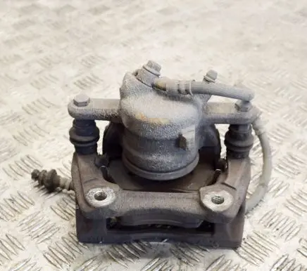 Nissan Note (E11) Front brake caliper