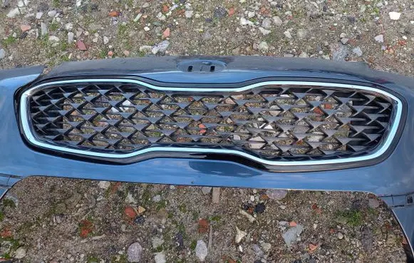 KIA Sportage Front bumper upper radiator grill 99910101090