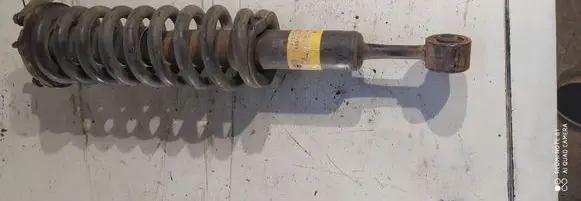 Front shock absorber with coil spring