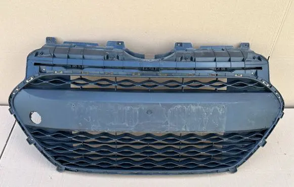 Hyundai i10 Front bumper upper radiator grill 86569B9000