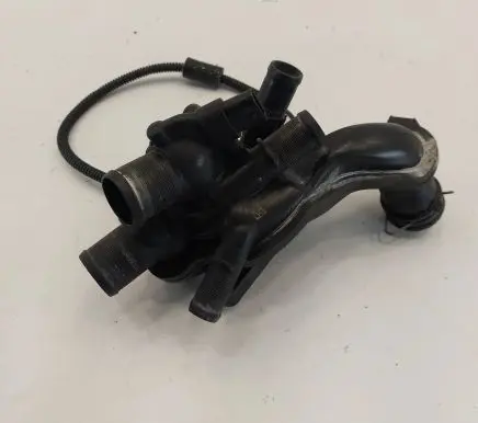 Thermostat/thermostat housing
