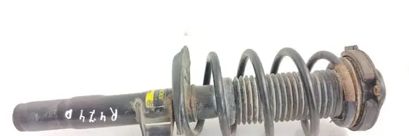 Volkswagen Caddy Front shock absorber with coil spring