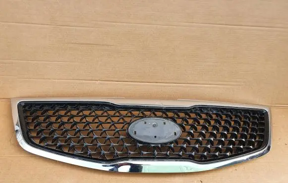 KIA Sportage Front bumper upper radiator grill 863523U500