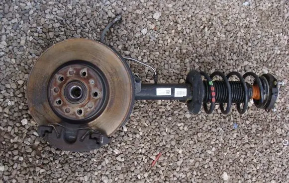 Volkswagen Caddy Front shock absorber with coil spring 2K5412021M