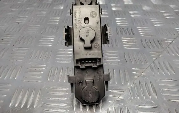 Tail light bulb cover holder
