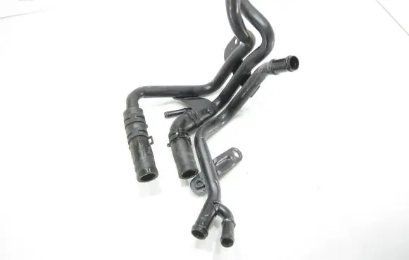 Volkswagen PASSAT B8 Engine coolant pipe/hose 04L121064AF