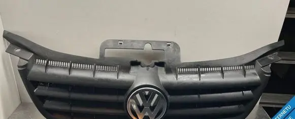 Volkswagen Touran I Front bumper upper radiator grill 1T0853651
