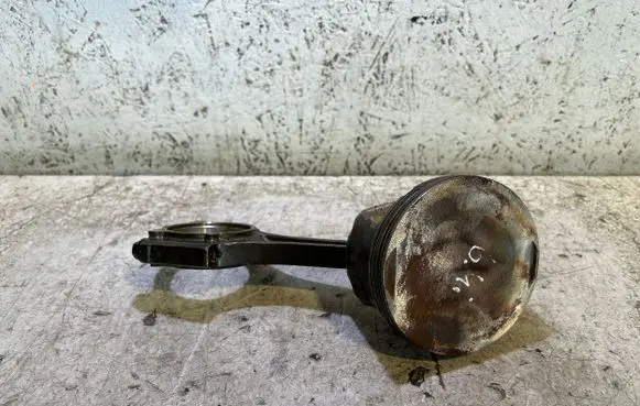Piston with connecting rod
