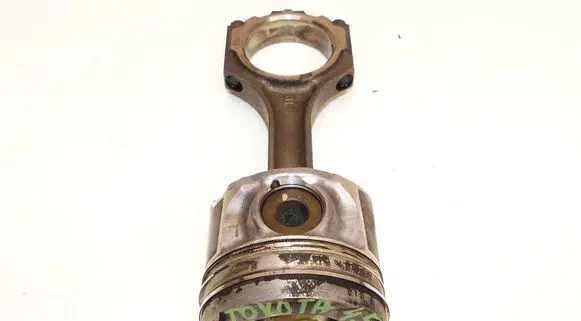Piston with connecting rod