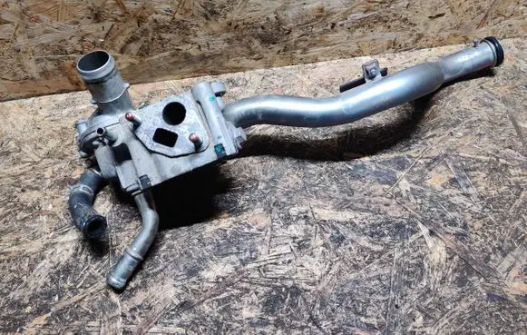 Thermostat/thermostat housing