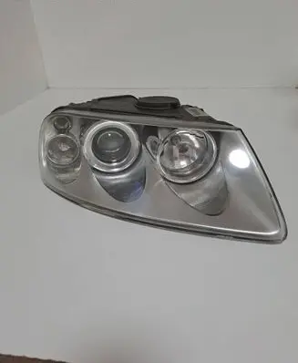 Volkswagen Touareg I Headlight/headlamp 7L6941018BF 89307885