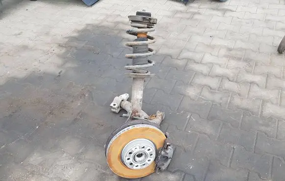 Front wheel hub spindle knuckle