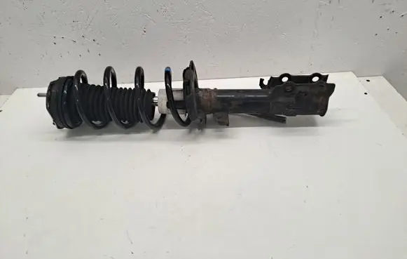 Ford Transit Courier Front shock absorber with coil spring