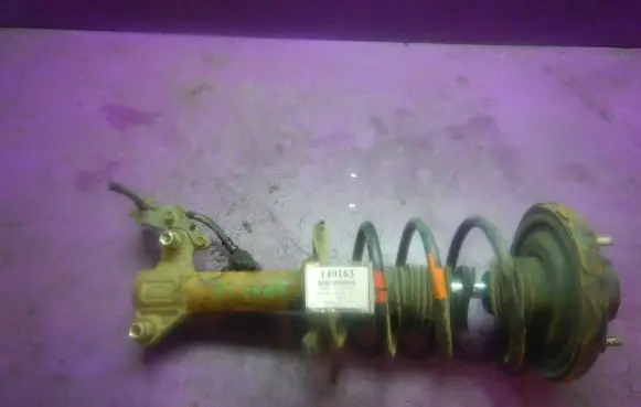 Nissan Primera Front shock absorber with coil spring