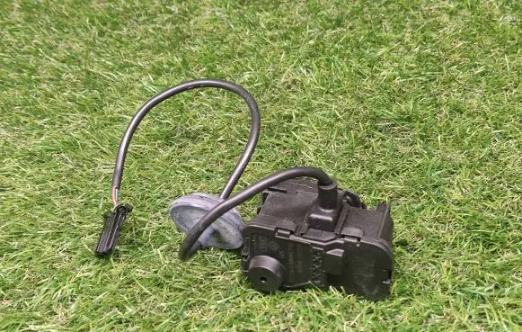 Fuel tank cap lock motor