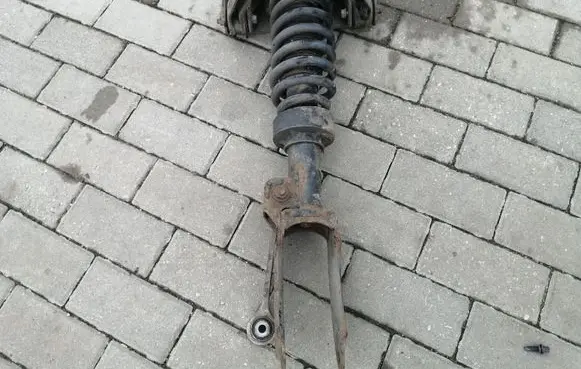 Volkswagen Touareg I Front shock absorber with coil spring 7L6412021P