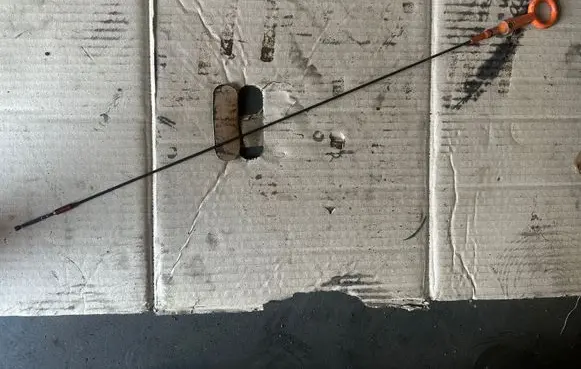 Oil level dip stick