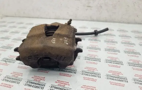 Volkswagen Golf IV Front brake caliper