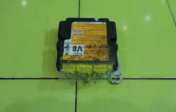 Nissan Juke I F15 Airbag control unit/module 0285012905