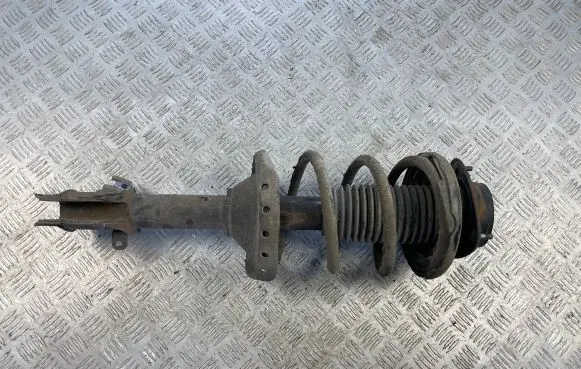 Front shock absorber with coil spring