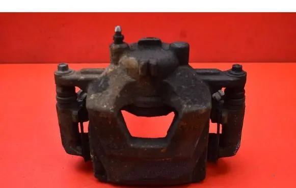 Opel Astra J Front brake caliper 