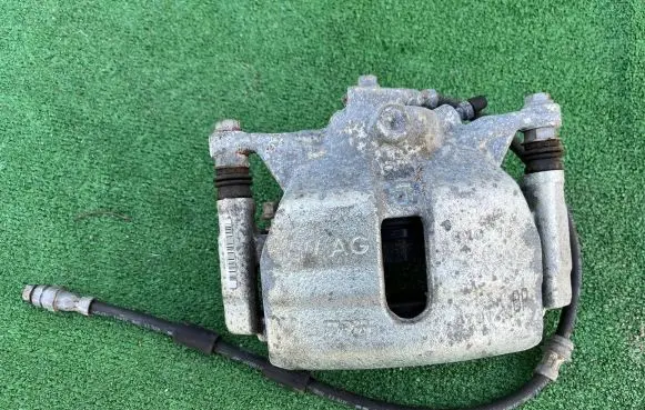 Volkswagen Golf VII Front brake caliper 5Q5DN