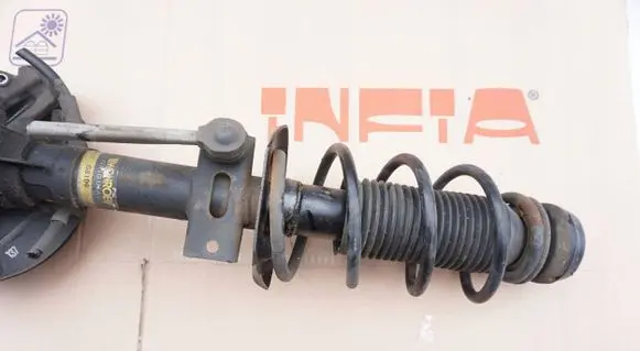 Volkswagen Polo V 6R Front shock absorber with coil spring SKO62556