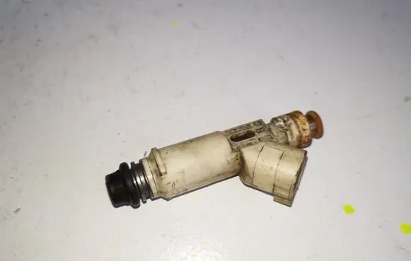 Ford Maverick Fuel injector YL8EC7B