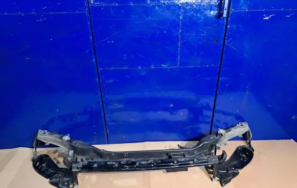 Top upper radiator support slam panel
