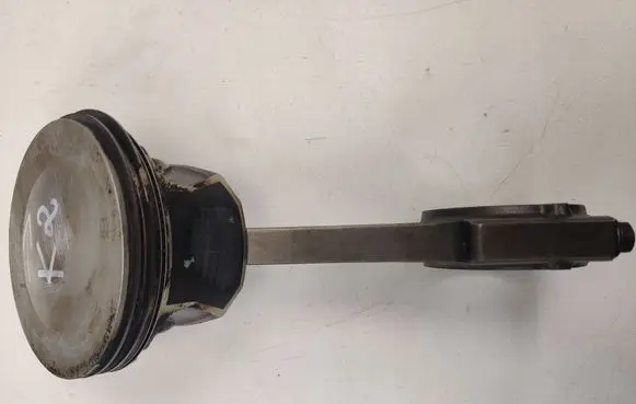 Piston with connecting rod