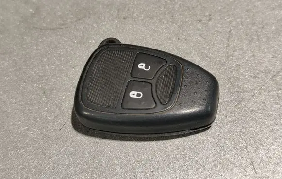 Chrysler Voyager Ignition key/card 04727353AC
