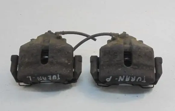 Volkswagen Touran I Front brake caliper 