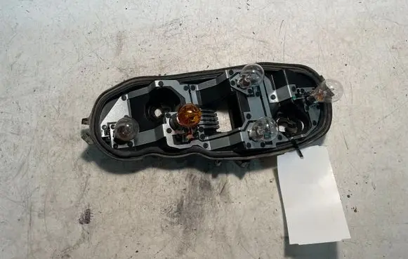 Opel Corsa D Tail light bulb cover holder 89037853A