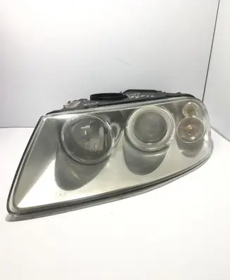 Volkswagen Touareg I Headlight/headlamp 7L6941015 89308531