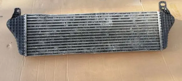 Volkswagen Multivan T5 Intercooler radiator 7E0145804A